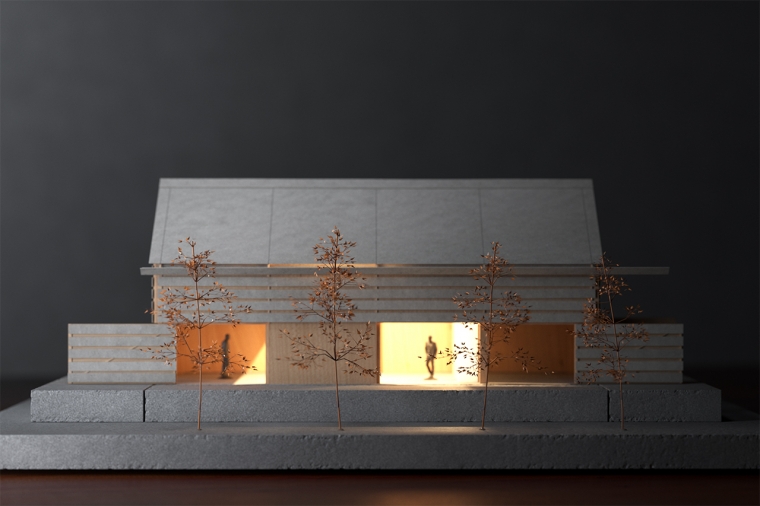 3D render of a barn conversion in the style of a scaled physical model at night